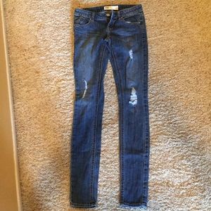 Never worn dark wash jeans